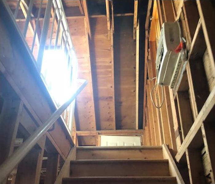 stair and attic after fire disaster restoration before repairs